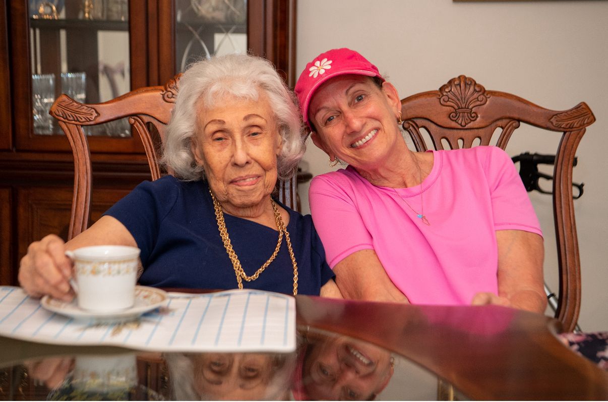 Senior and volunteer sharing a moment
